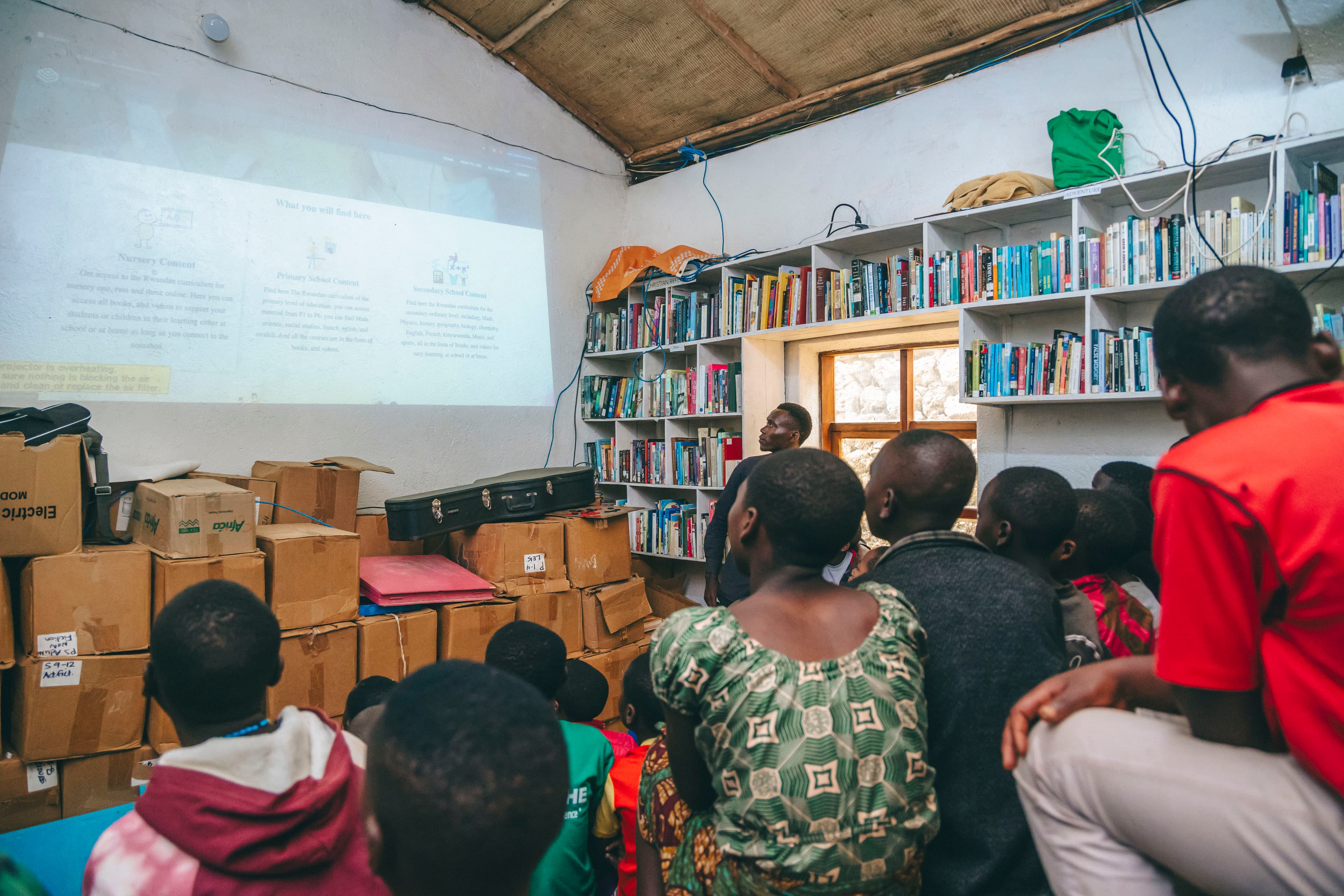 Soma Foundation Rwanda team presenting how SomaBox works