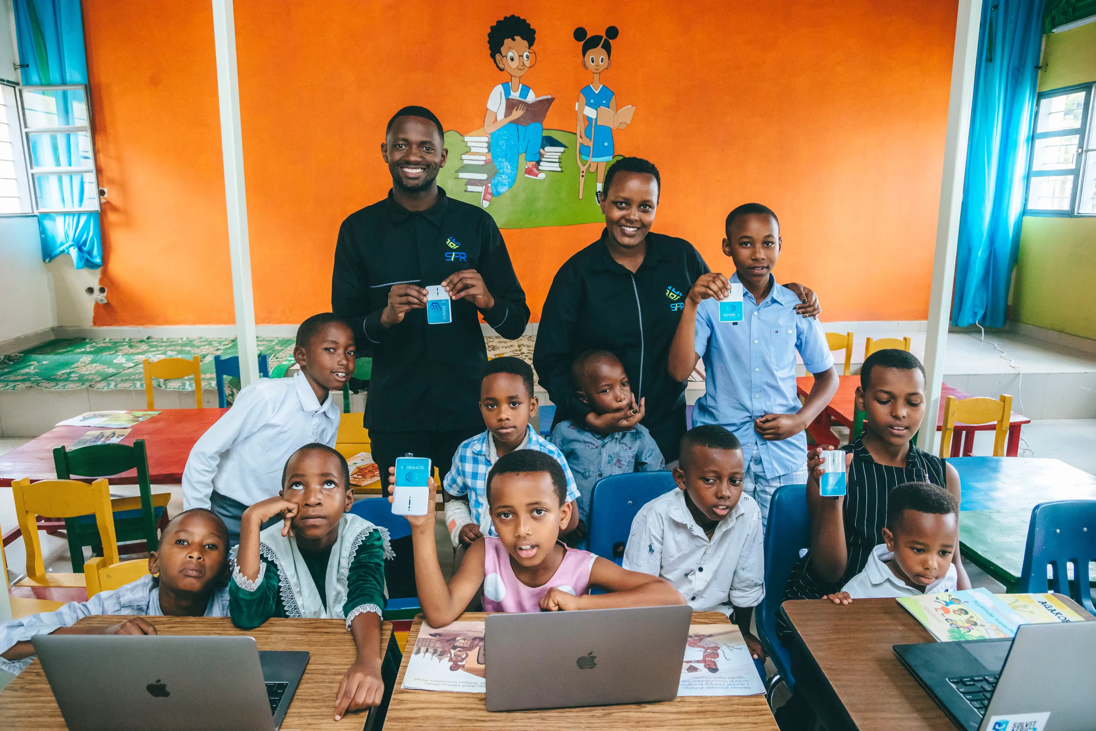 Students and Soma Foundation Team Holding SomaBox