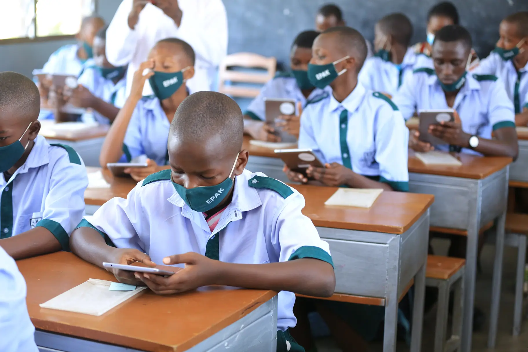 Students in classroom with assistive technology