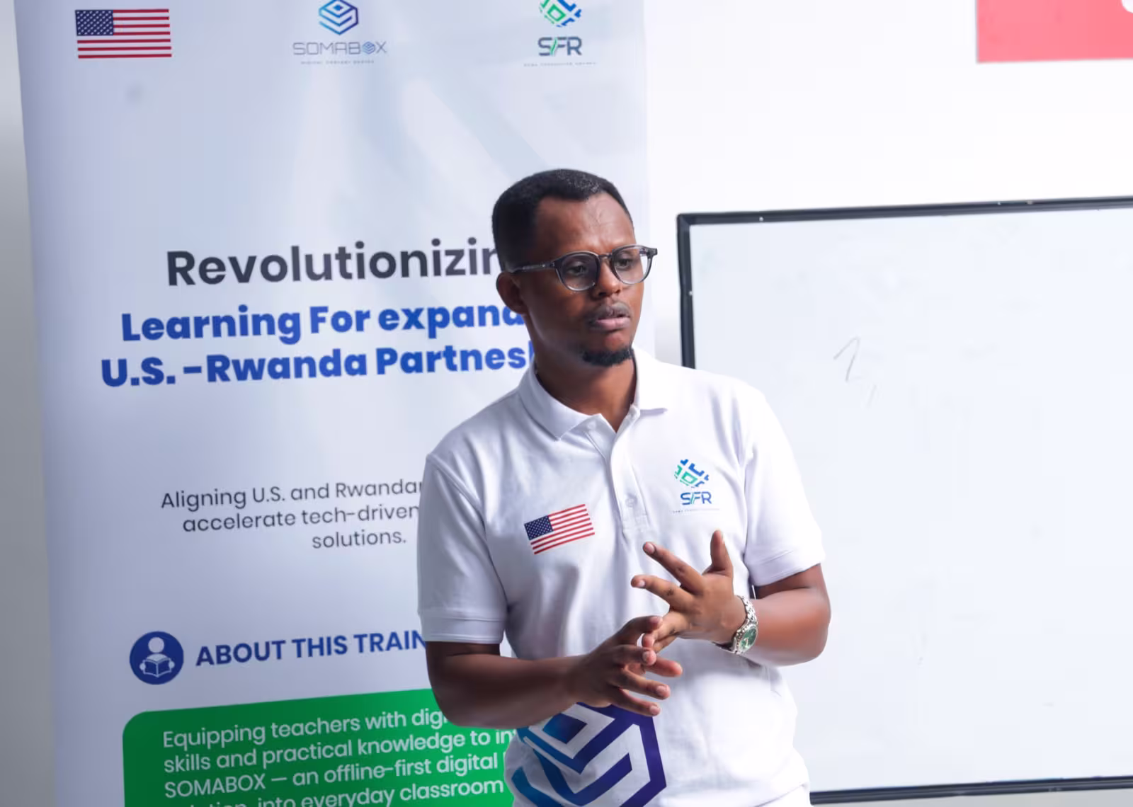 A facilitator explaining SomaBox during the teacher training