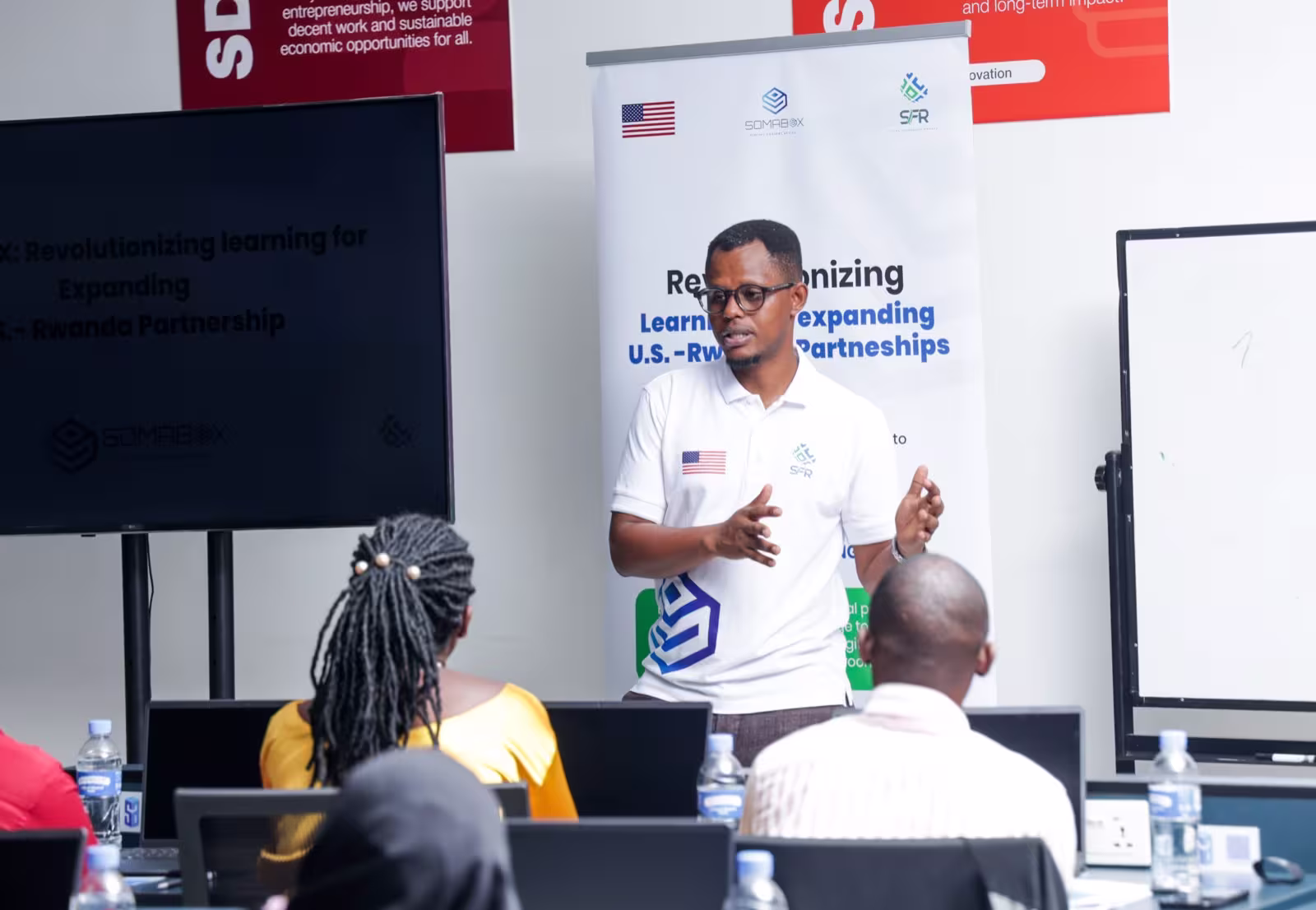 A facilitator leading a session at the SomaBox teacher training