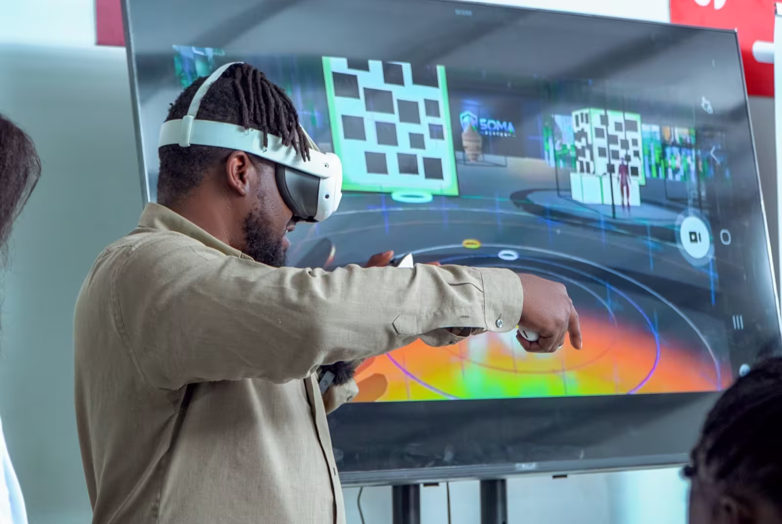 A participant exploring a virtual classroom with a VR headset during the SomaBox teacher training