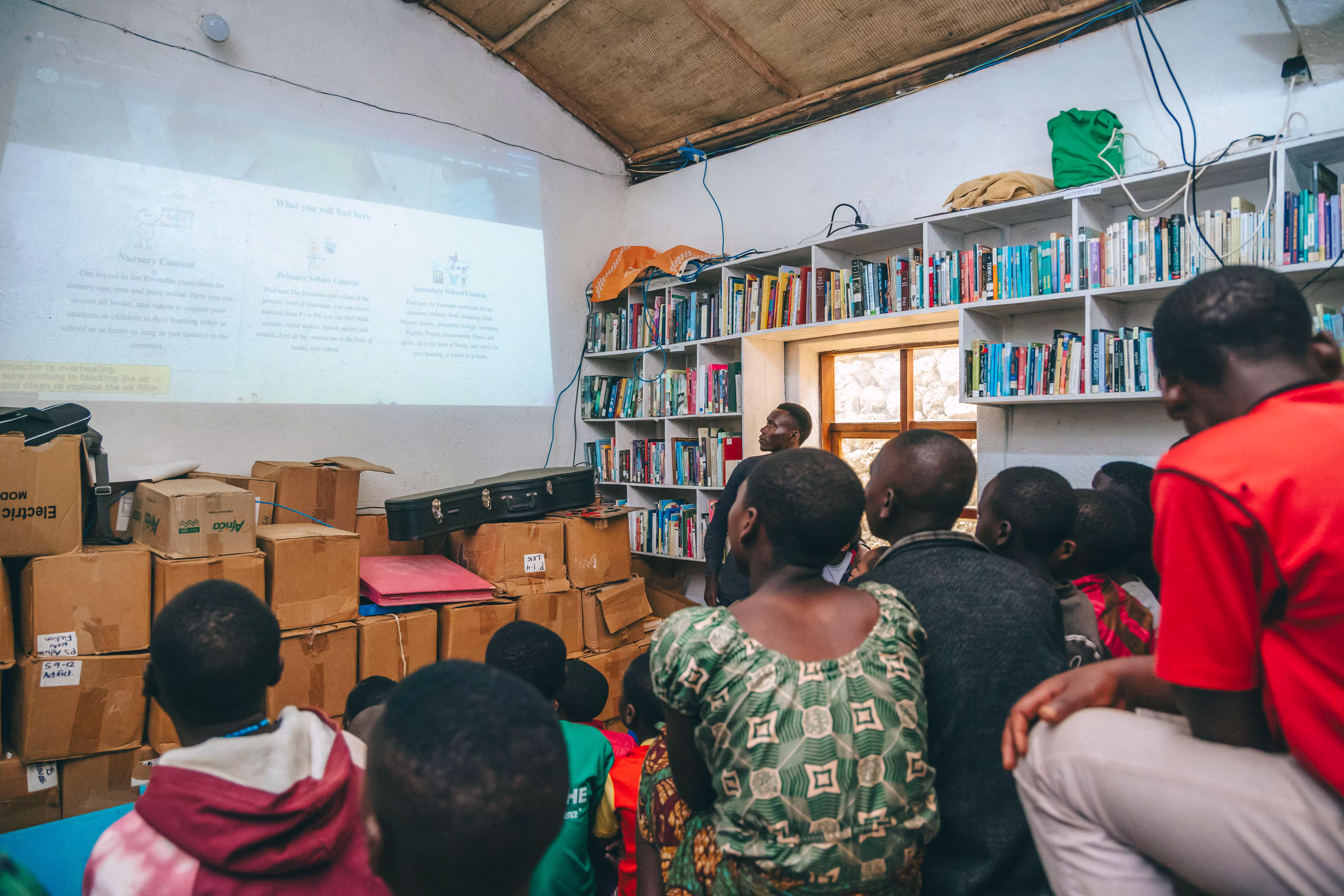 Soma Foundation Rwanda team presenting how SomaBox works
